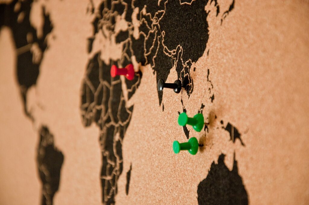 bulletin board, pin board, map of the world